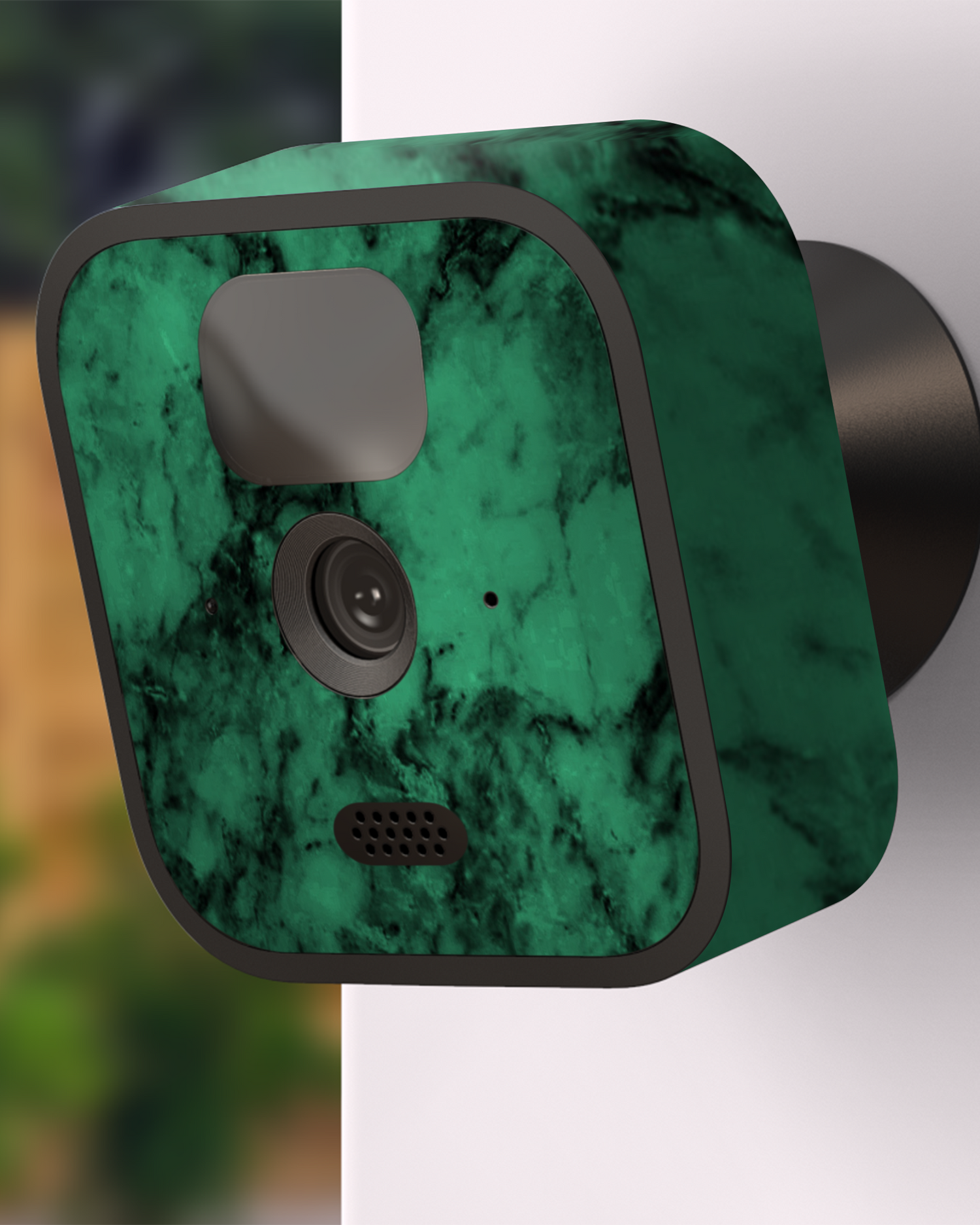 Green Marble Camera Skin Blink Outdoor (2020) attached to exterior wall