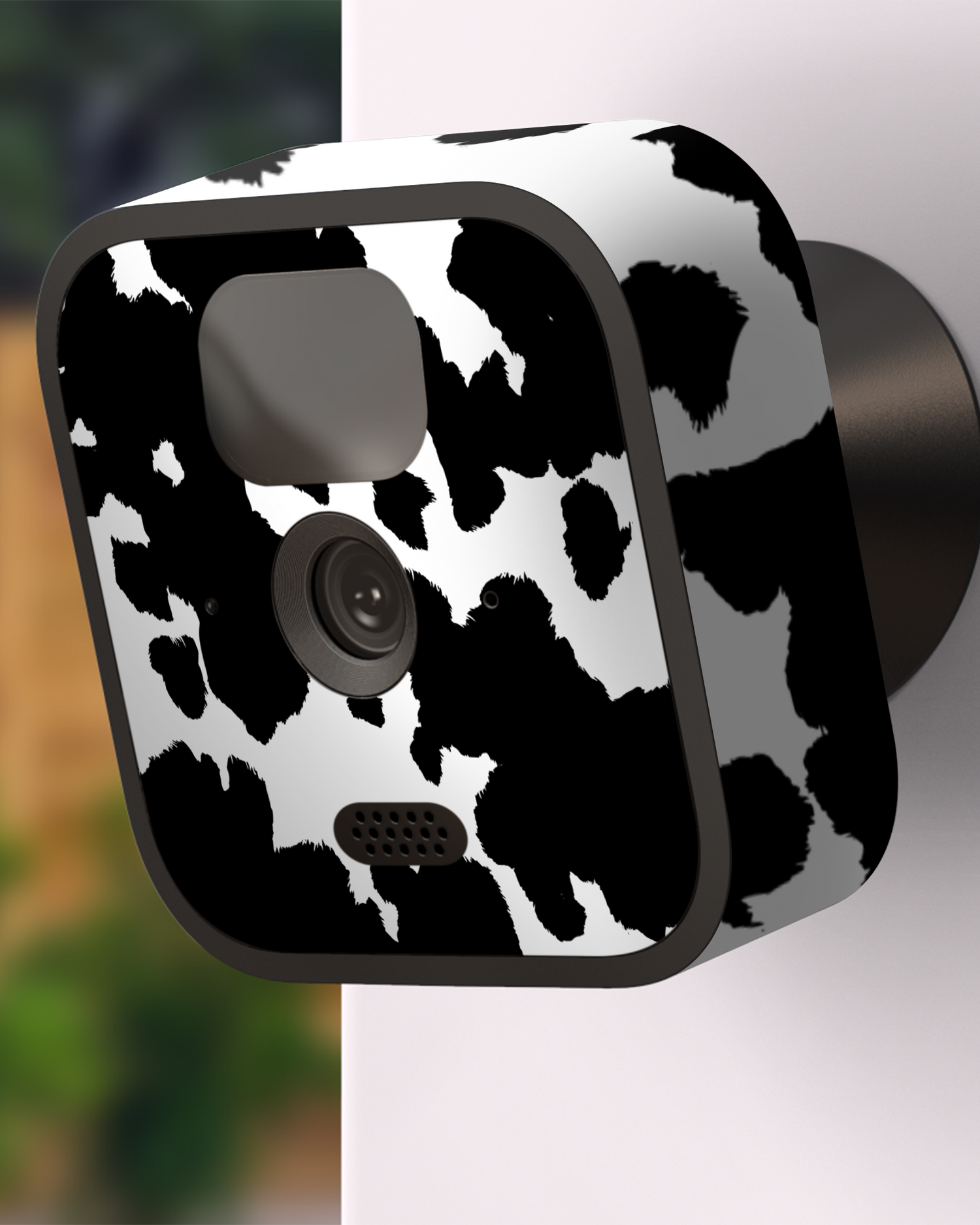 Cow Print Camera Skin Blink Outdoor (2020) attached to exterior wall