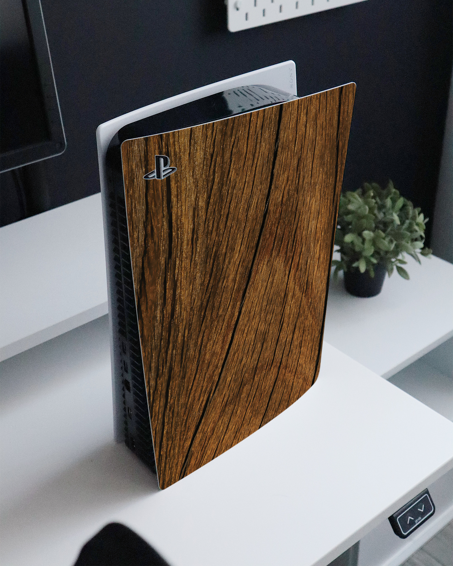 Wood Console Skin for Sony PlayStation 5 Digital Edition standing on a sideboard 