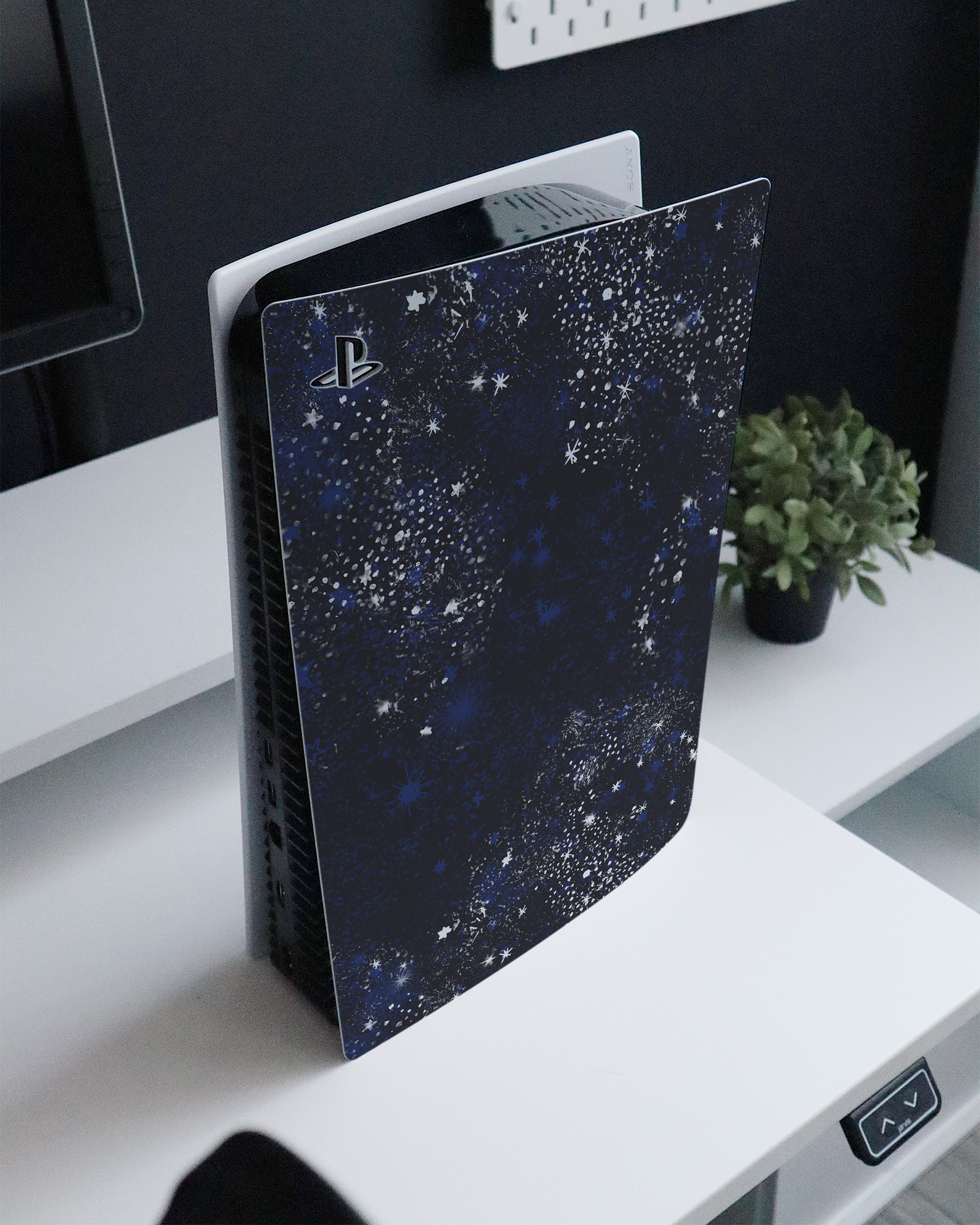 Starry Night Sky Console Skin for Sony PlayStation 5 Digital Edition standing on a sideboard 
