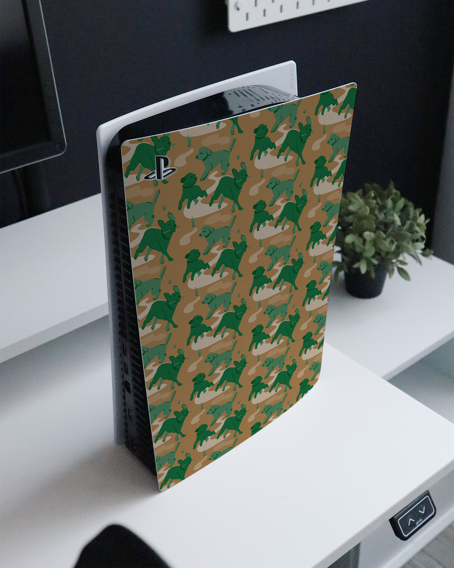 Dog Camo Console Skin for Sony PlayStation 5 Digital Edition standing on a sideboard 
