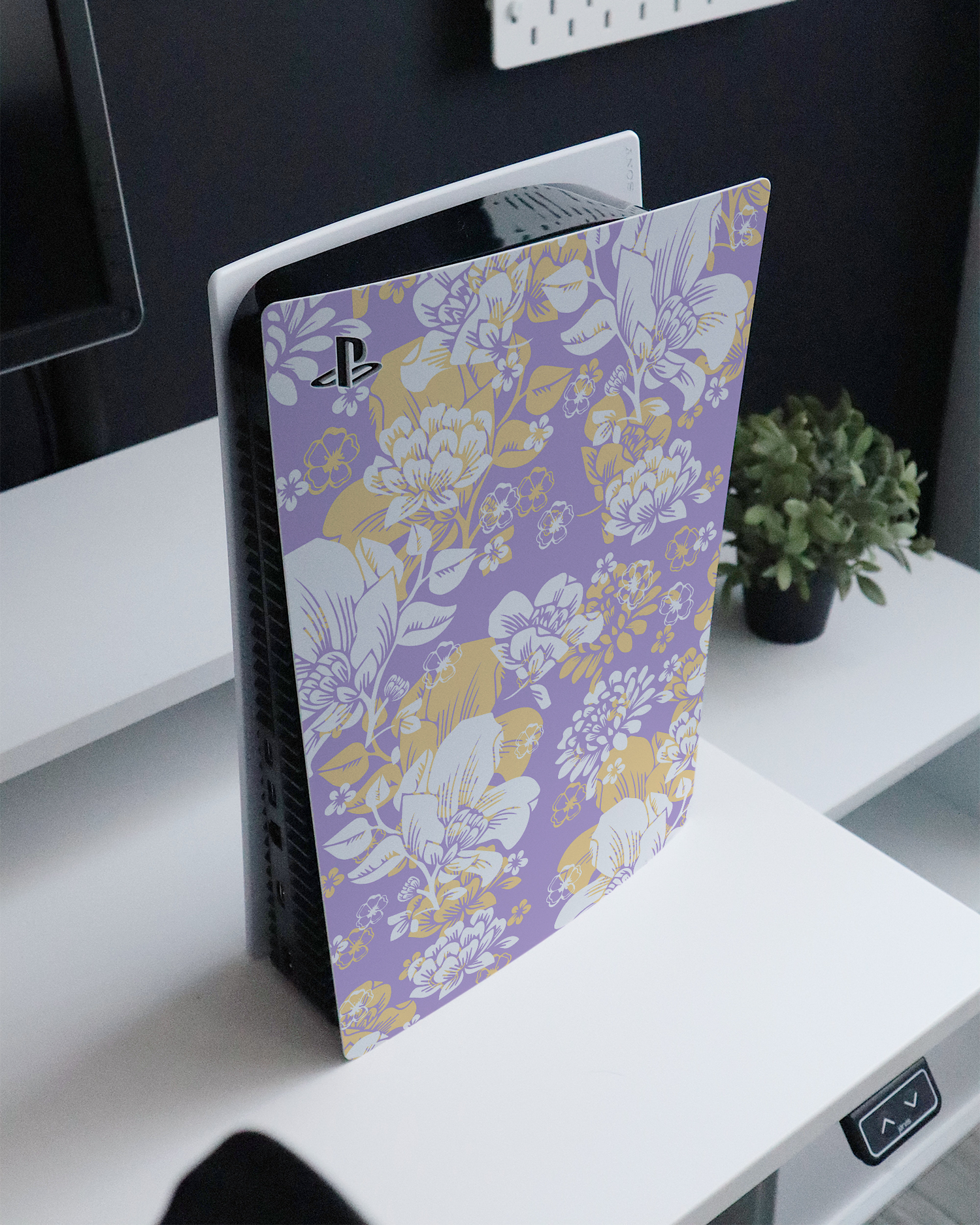 Lavender Floral Console Skin for Sony PlayStation 5 Digital Edition standing on a sideboard 