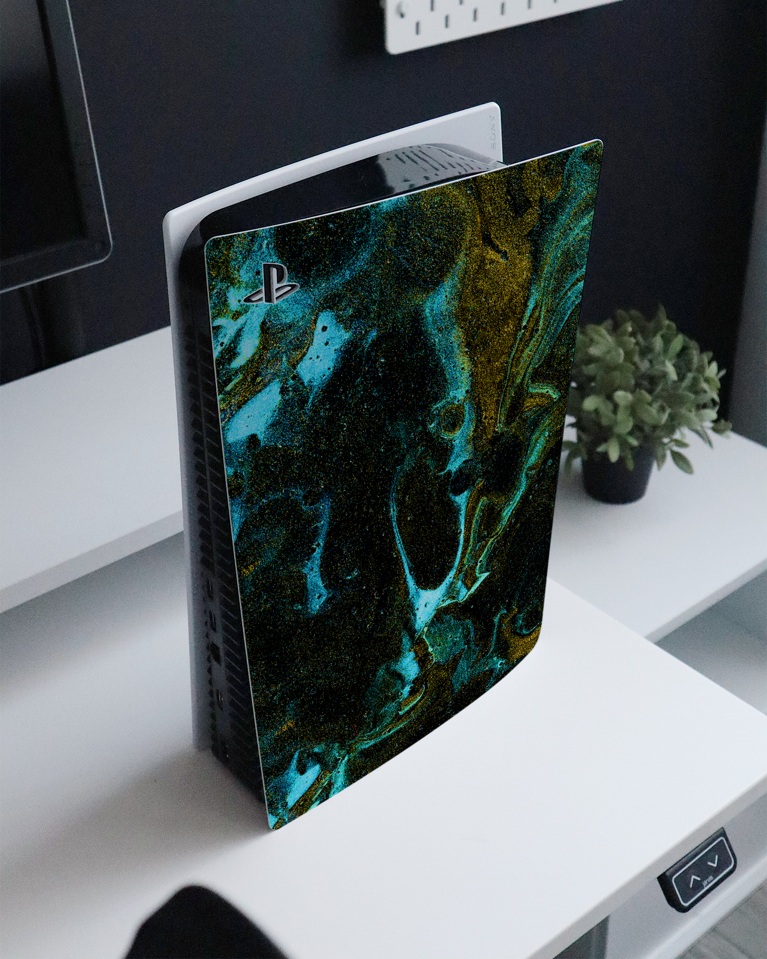 Mint Gold Marble Sparkle Console Skin for Sony PlayStation 5 Digital Edition standing on a sideboard 