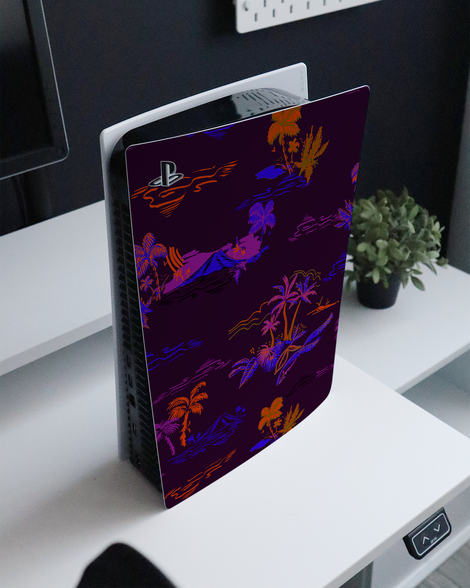 Neon Aloha Console Skin for Sony PlayStation 5 standing on a sideboard 