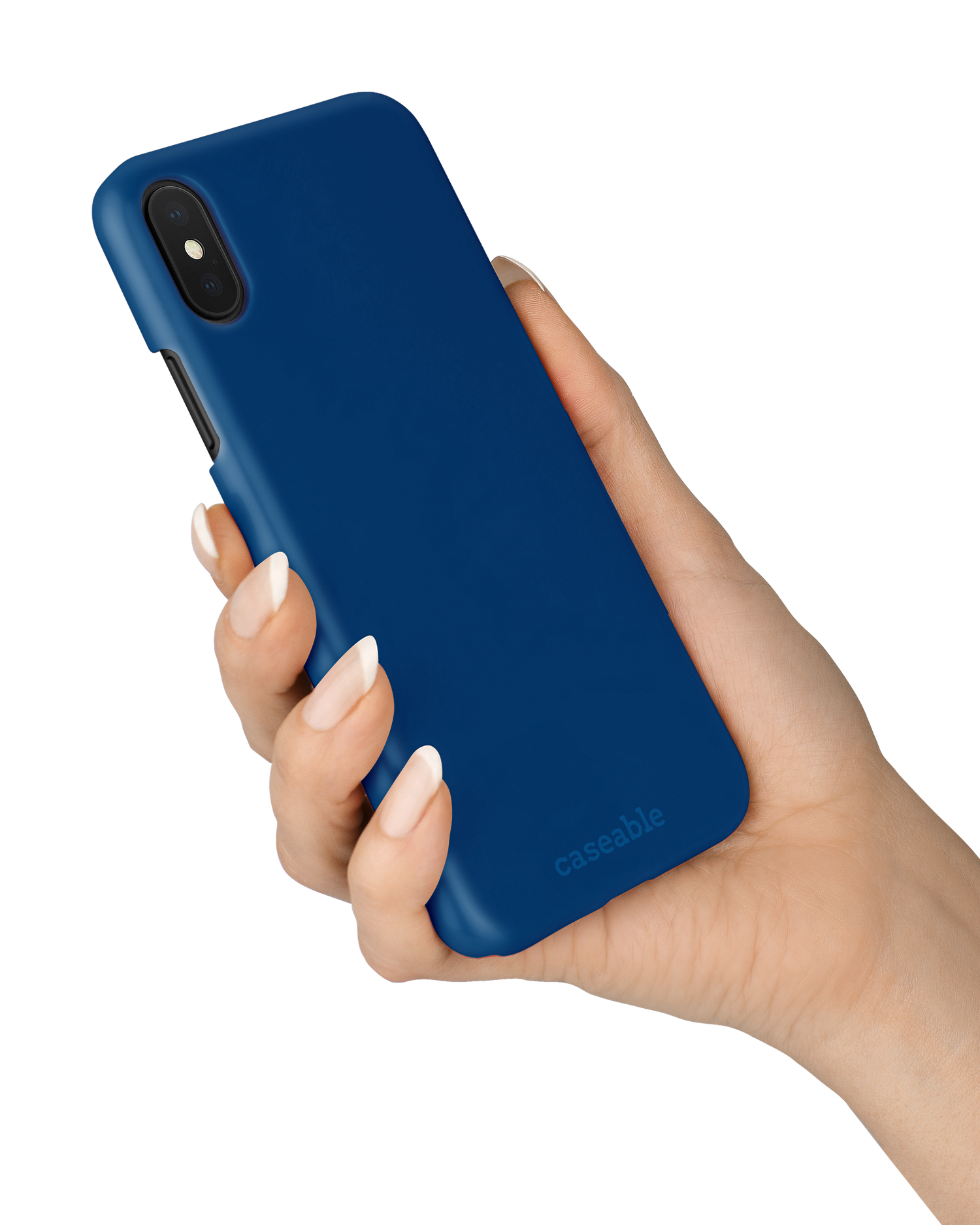 CLASSIC BLUE Hard Shell Phone Case Apple iPhone X, Apple iPhone XS held in hand