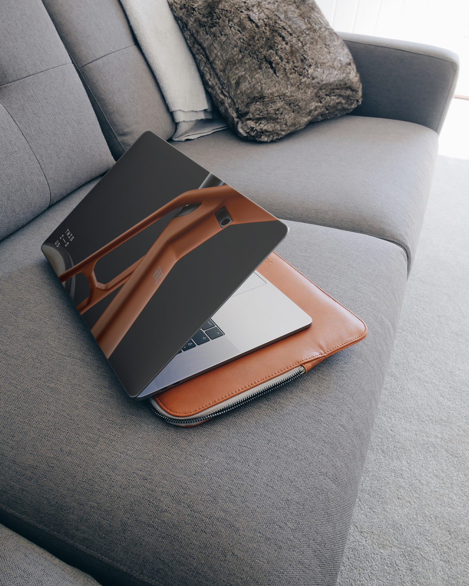 VRC Laptop Skin for 15 inch Apple MacBooks on a couch