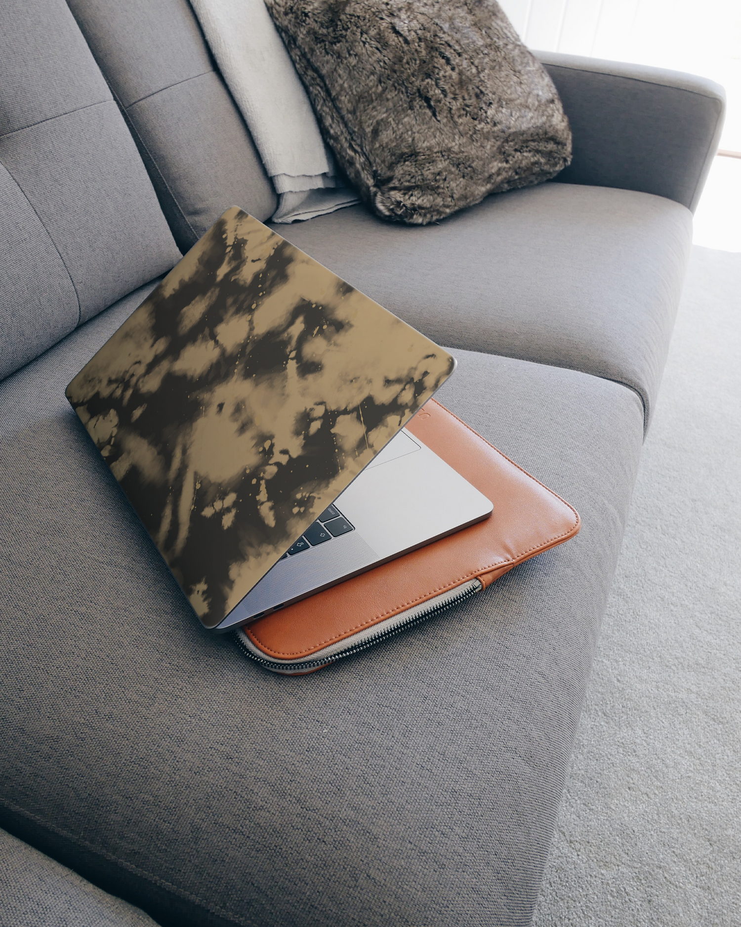 Bleached Laptop Skin for 15 inch Apple MacBooks on a couch