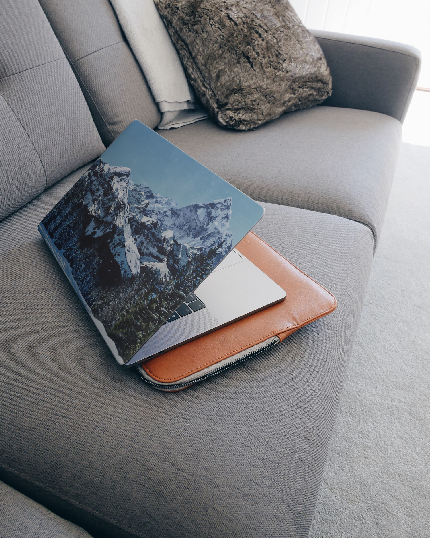 Winter Landscape Laptop Skin for 15 inch Apple MacBooks on a couch