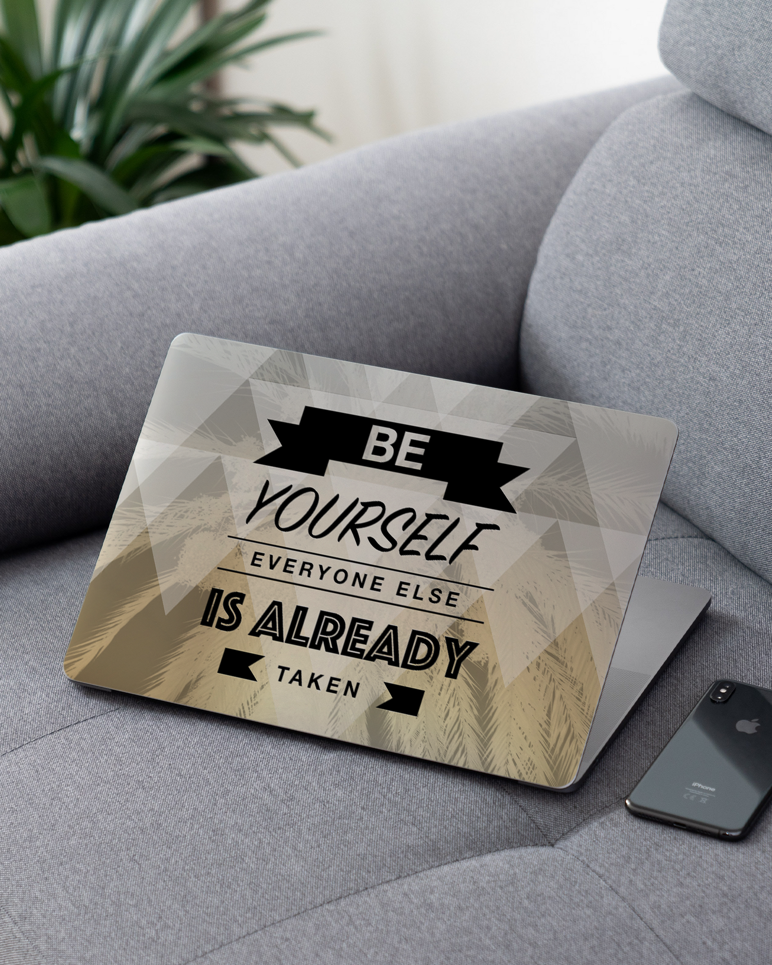 Be Yourself Laptop Skin for 13 inch Apple MacBooks on a couch